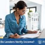 How do lenders verify income? with a photo of a woman looking at paperwork